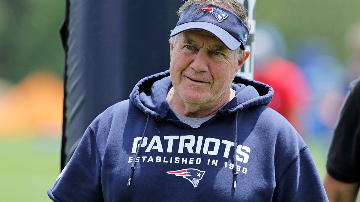 New England Patriots head coach Bill Belichick smiles as he walks off the field during an NFL football training camp in Foxborough, Mass., Wednesday, June 5, 2019.