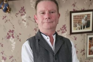 Three men charged after man, 55, stabbed to death in market town