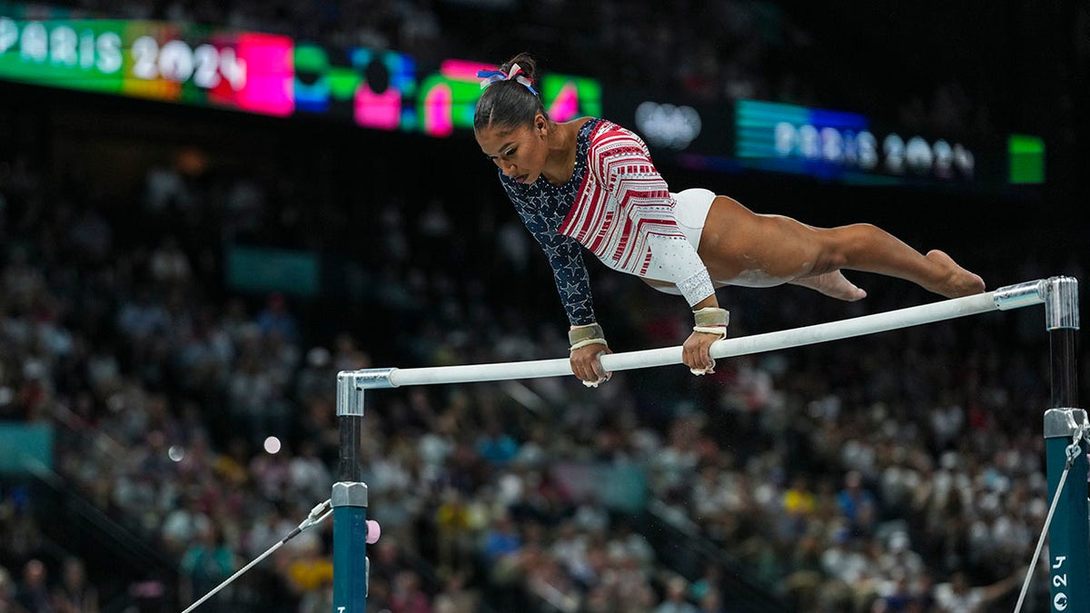 Jordan Chiles competes on uneven bars