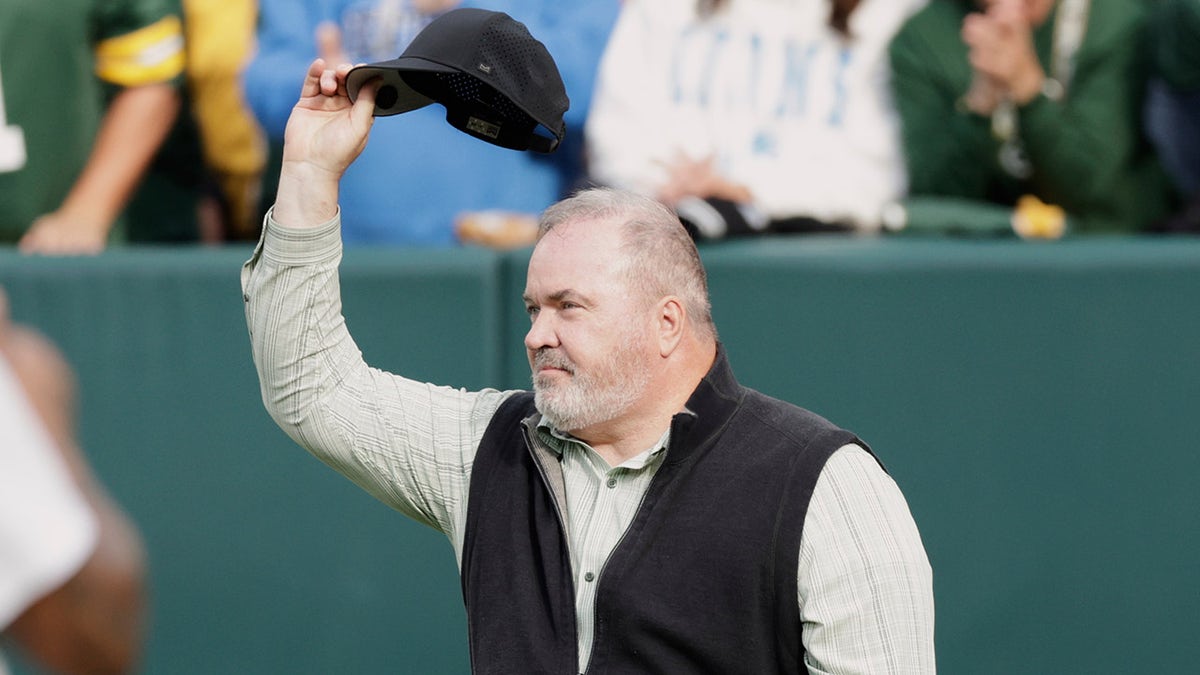 Mike McCarthy honored at a Packers game
