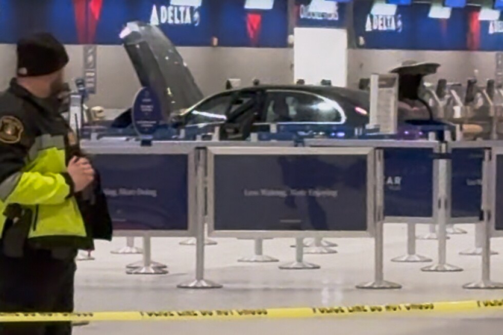 6 injured when car crashes into Detroit-area airport
