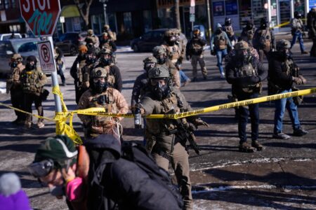 Photos: Federal agents, protesters face off following killing of man in Minneapolis amid immigration crackdown
