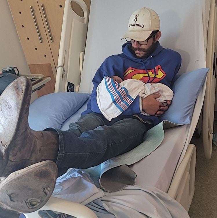 Bailey shared this photo of Misner with their first child.