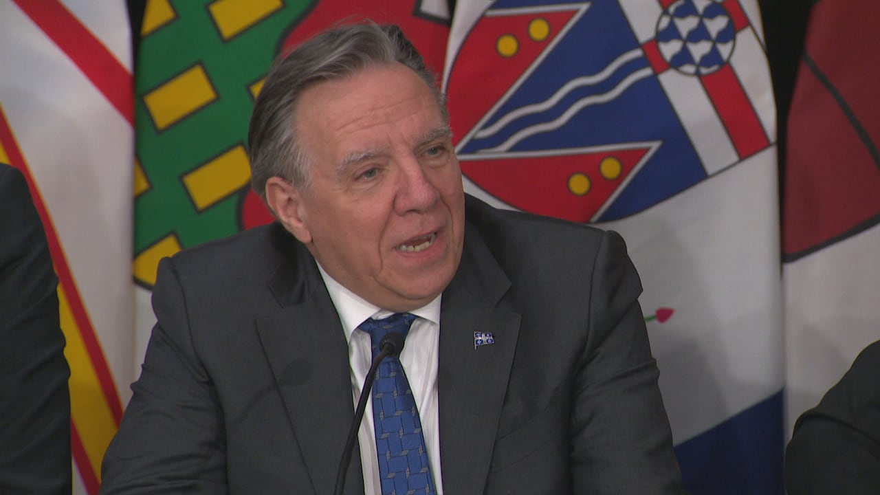 Francois Legault is speaking at a press conference