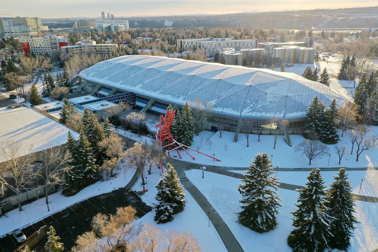 A snow-covered building is shown from above.