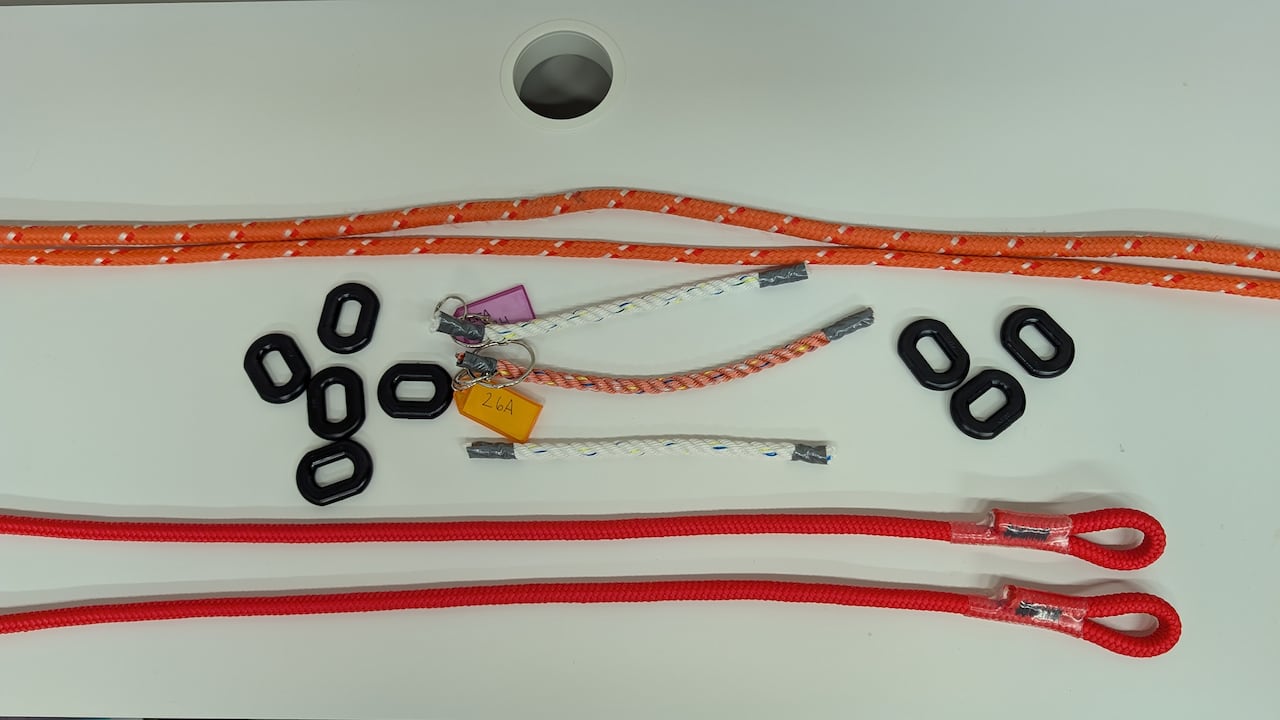 Ropes and plastic links on a table 