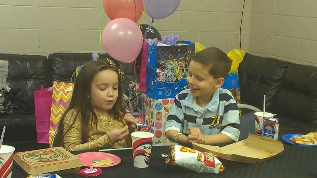 Two children sitting together 