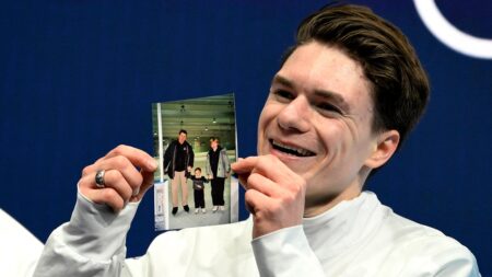 US figure skater Maxim Naumov honors late parents in emotional Olympic performance