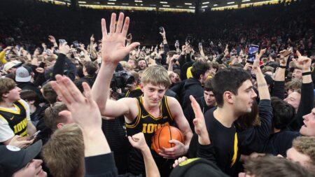 Court storm turns hectic as coach smacks fan’s phone; school apologizes for forcing ‘reactive situation’