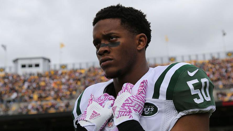 Ex-NFL player Lee charged with murdering girlfriend