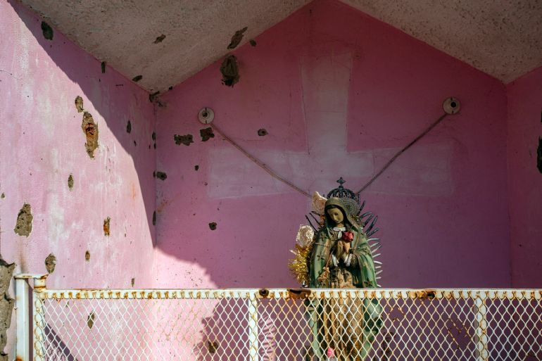 Bullet holes are seen in a sanctuary at El Aguaje community, after a confrontation between Los Viagras Cartel and the Jalisco Nueva Generacion Cartel,
