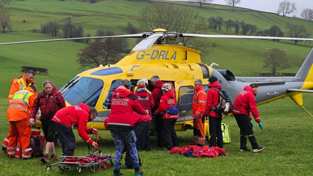 Teenager is airlifted to hospital after plunging 65ft at beauty spot during walk