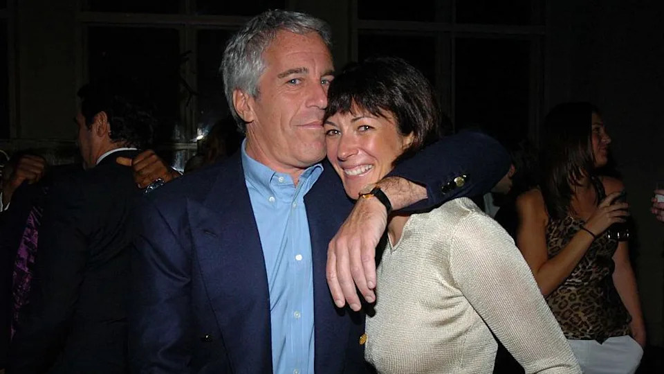 Jeffrey Epstein and Ghislaine Maxwell pose for a photograph at a party