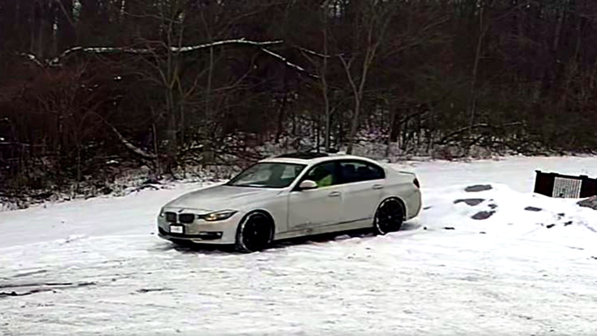 suspect in white BMW