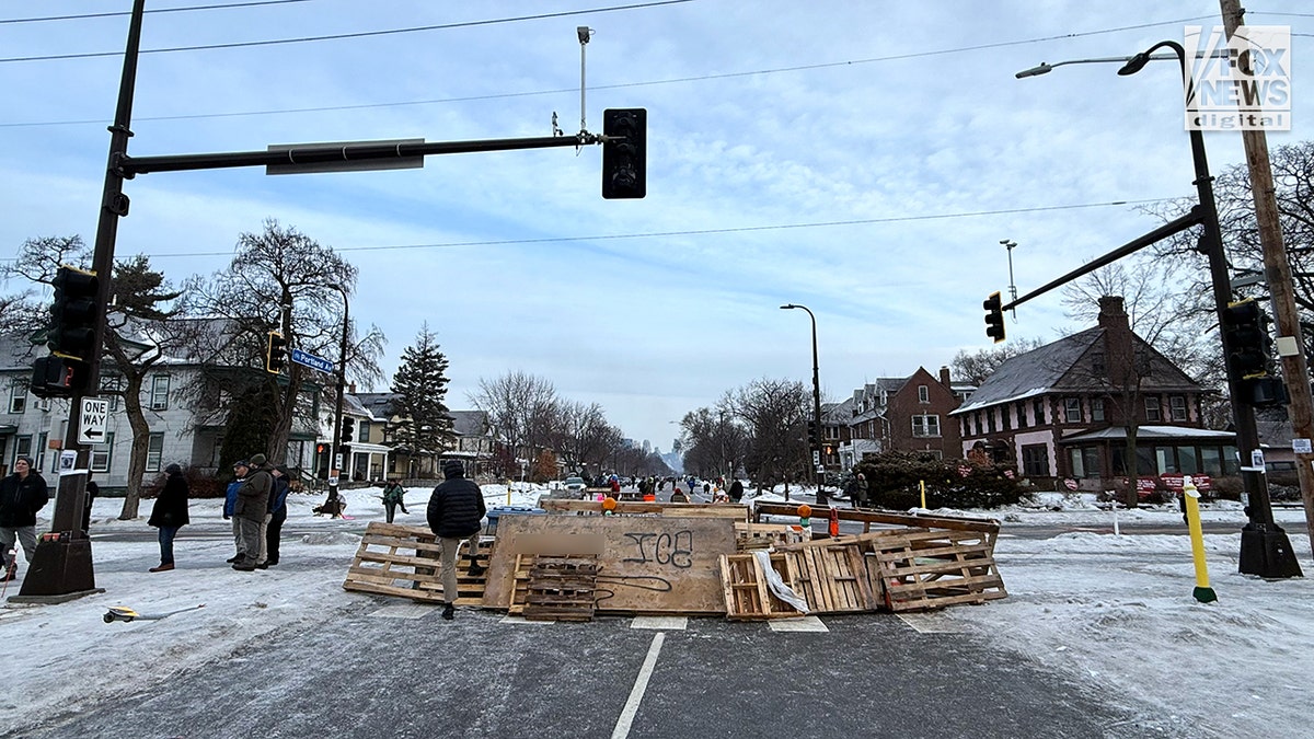 Location of ICE shooting barricaded by residents in Minneapolis