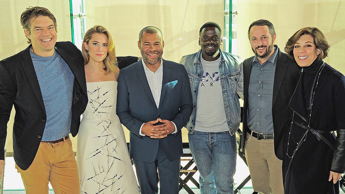 Jason Blum, Allison Williams, Jordan Peele, Daniel Kaluuya, Sean McKittrick and Peggy Siegal smiling.