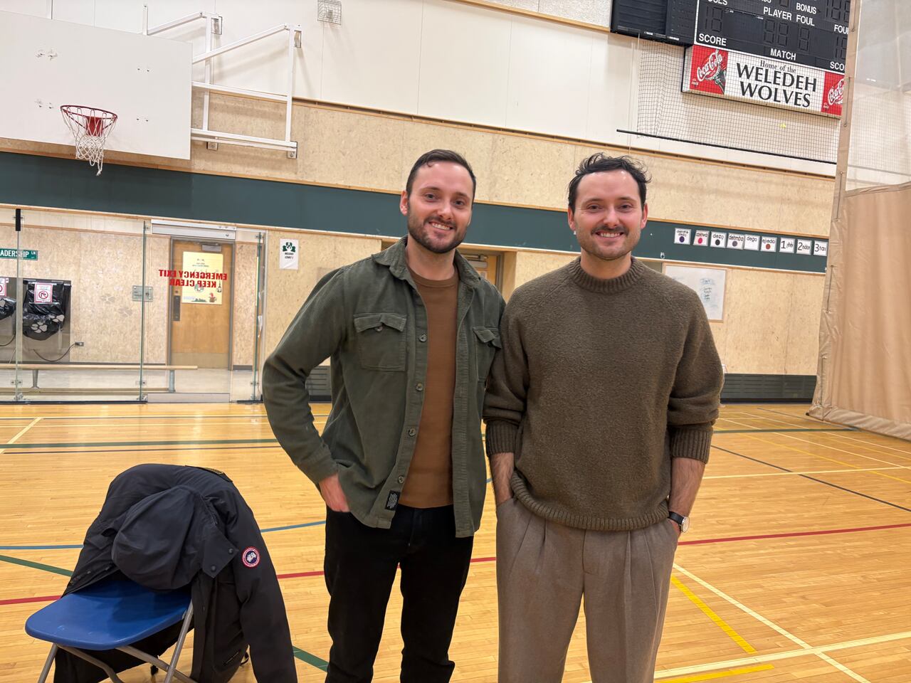 Twin brothers Jacob and Aidan Charpentier in a school gym