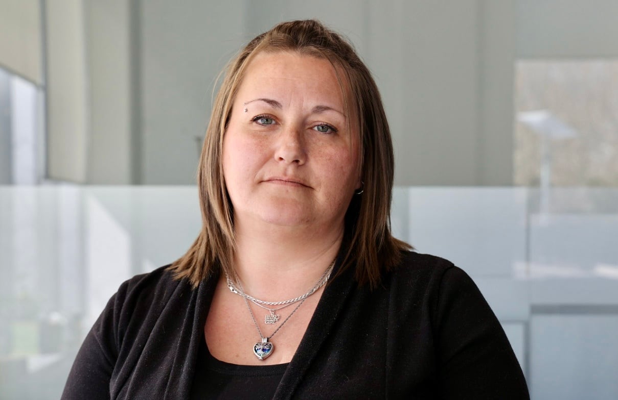 Woman in a black cardigan