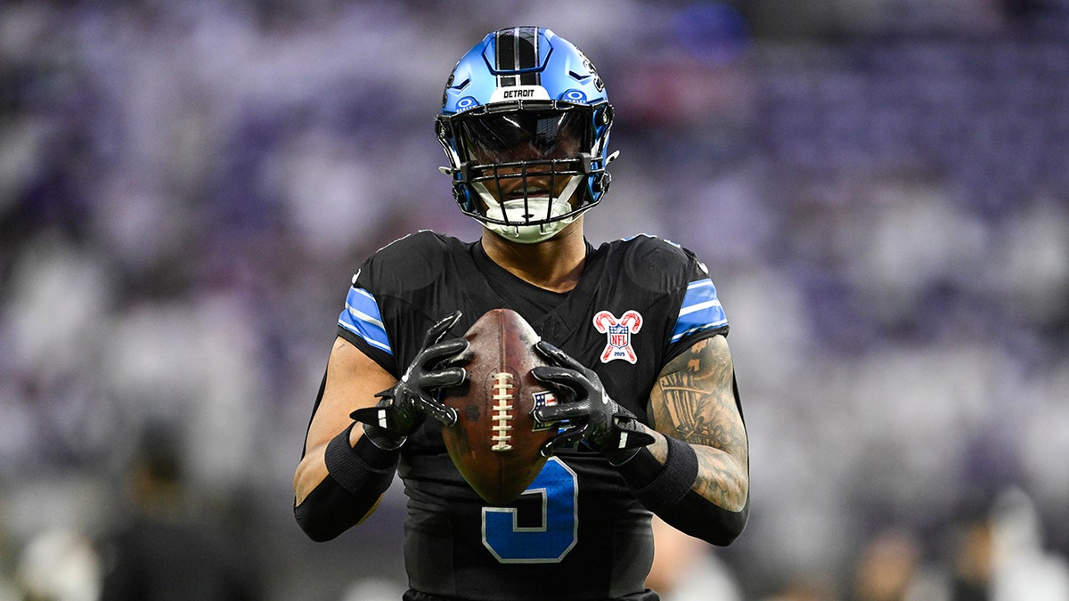 David Montgomery looks on field