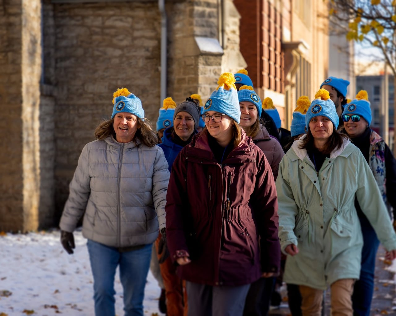 walkers outside wearing toques