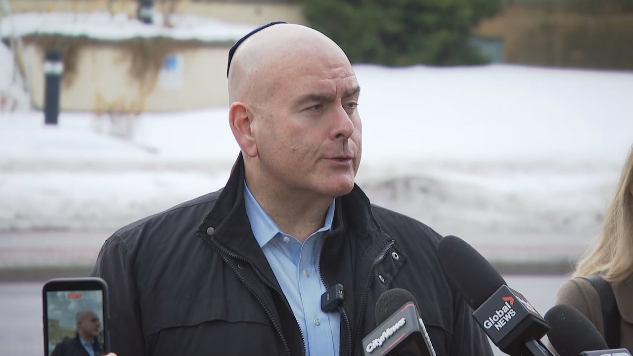 Man speaks into microphone