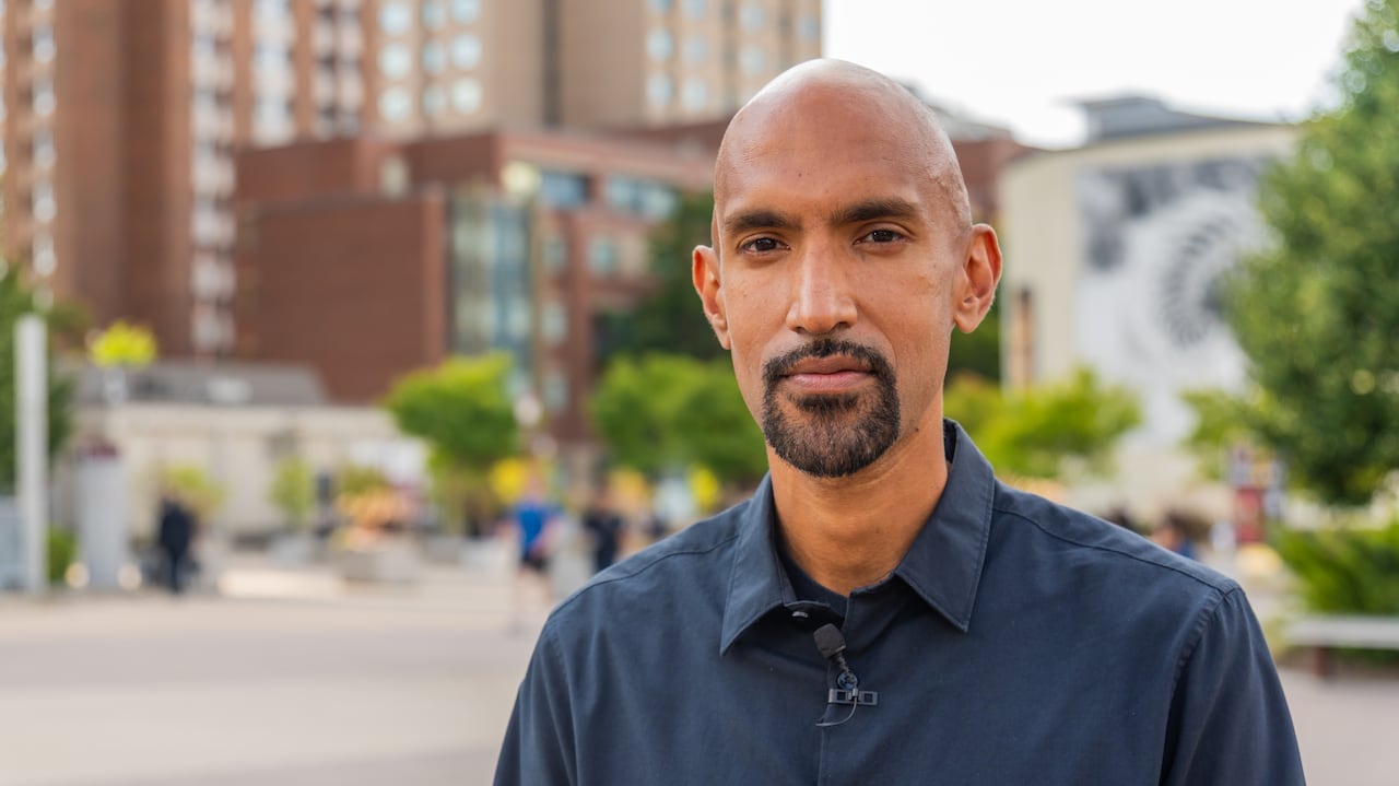 A photo of a professor outside on University of Ottawa campus