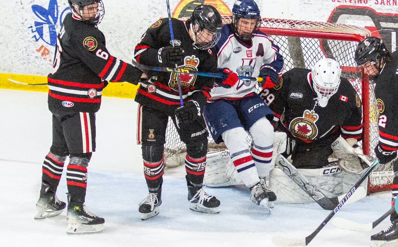 The LaSalle Vipers and Legionnaires battle for the puck in front of Sarnia's net in GOHL action earlier this season.