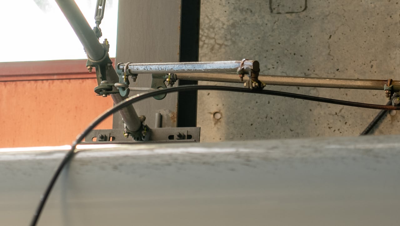 Overhead power equipment atop a train.