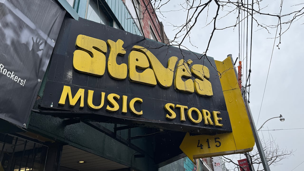Yellow and black store sign