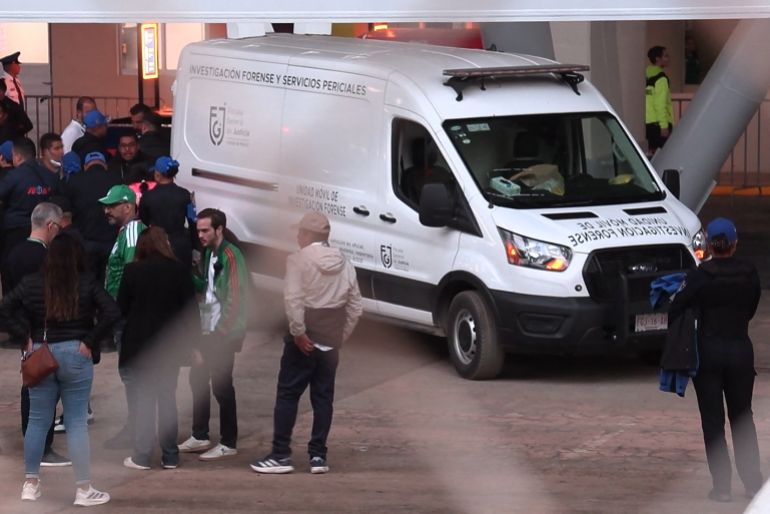This frame grab from AFPTV footage shows a forensic investigation van where a spectator died after falling from an upper level of the stadium before the friendly football match between Mexico and Portugal at the Banorte (formerly known as Azteca) Stadium in Mexico City on March 28, 2026. In the VIP section of the Estadio Ciudad de Mexico (Azteca), an intoxicated fan attempted to jump from the second level to the first by climbing over the outer railing, causing him to fall to the ground floor. He was treated by medical personnel but, unfortunately, died, the Secretariat of Civil Security reported in a statement. (Photo by Ivan CASTANEIRA / AFPTV / AFP)