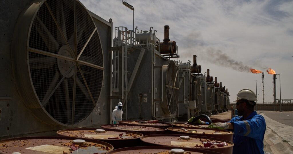 Oil tops $116 a barrel as Iran accuses US of preparing invasion