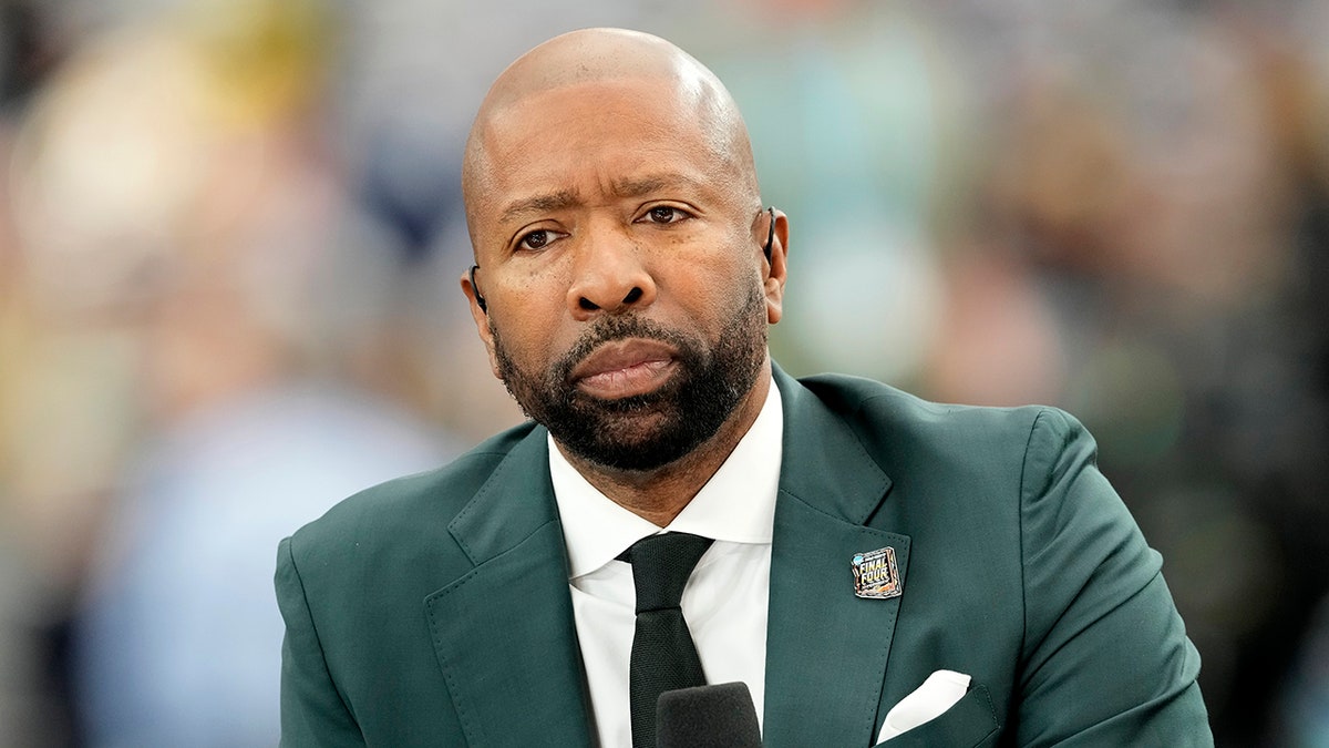 Kenny Smith on a television set