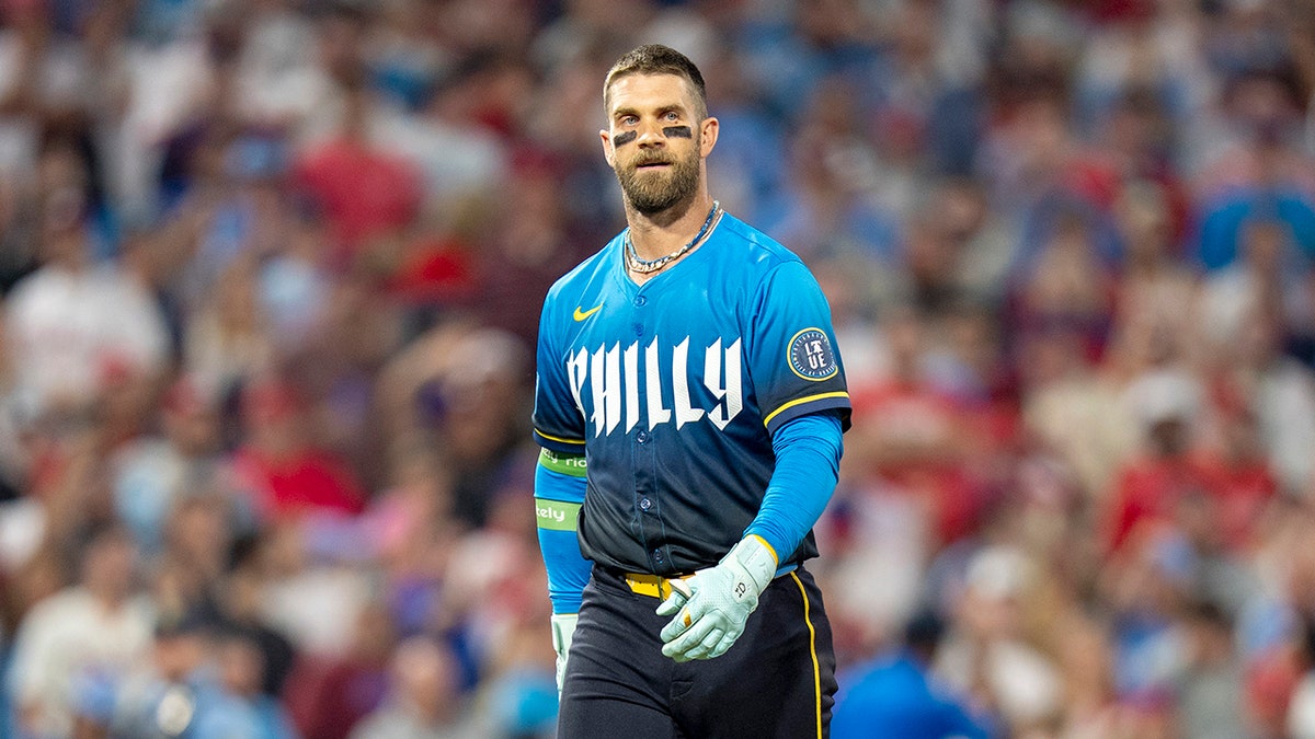 Bryce Harper looks on