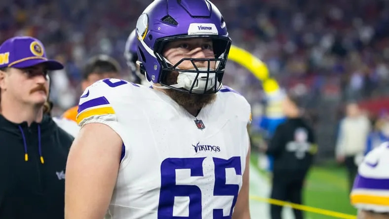 Jan 13, 2025; Glendale, AZ, USA; Minnesota Vikings guard Michael Jurgens (65) against the Los Angeles Rams during an NFC wild card game at State Farm Stadium. Mandatory Credit: Mark J. Rebilas-Imagn Images.