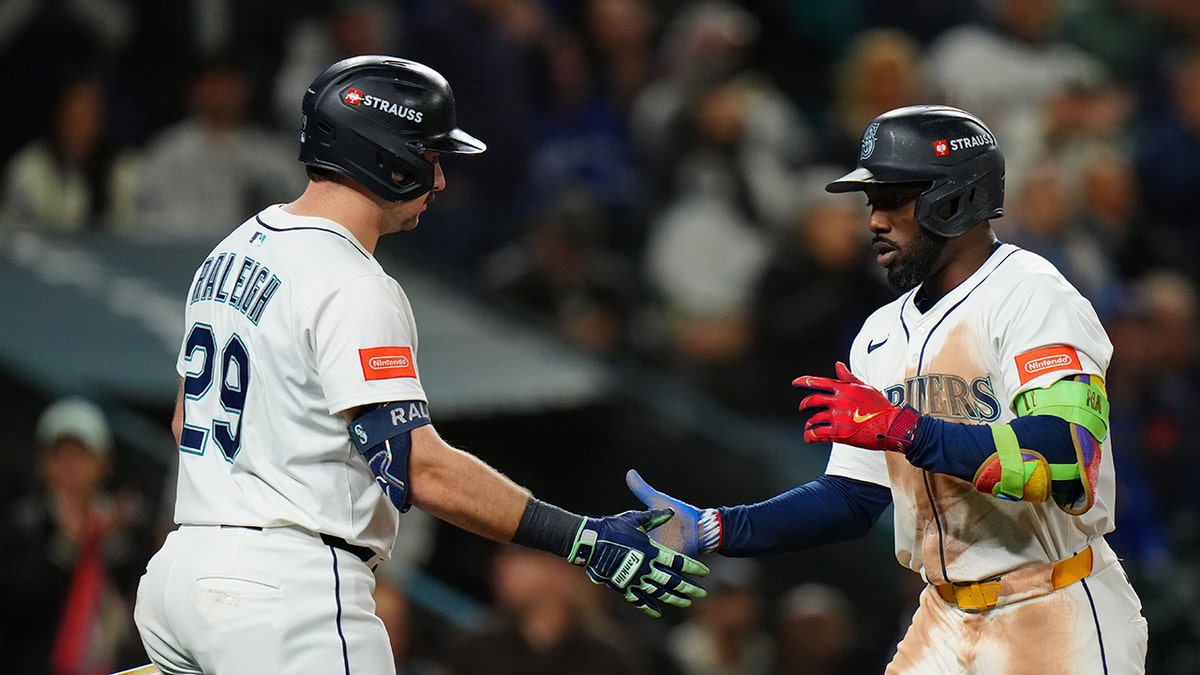 Randy Arozarena Cal Raleigh high five