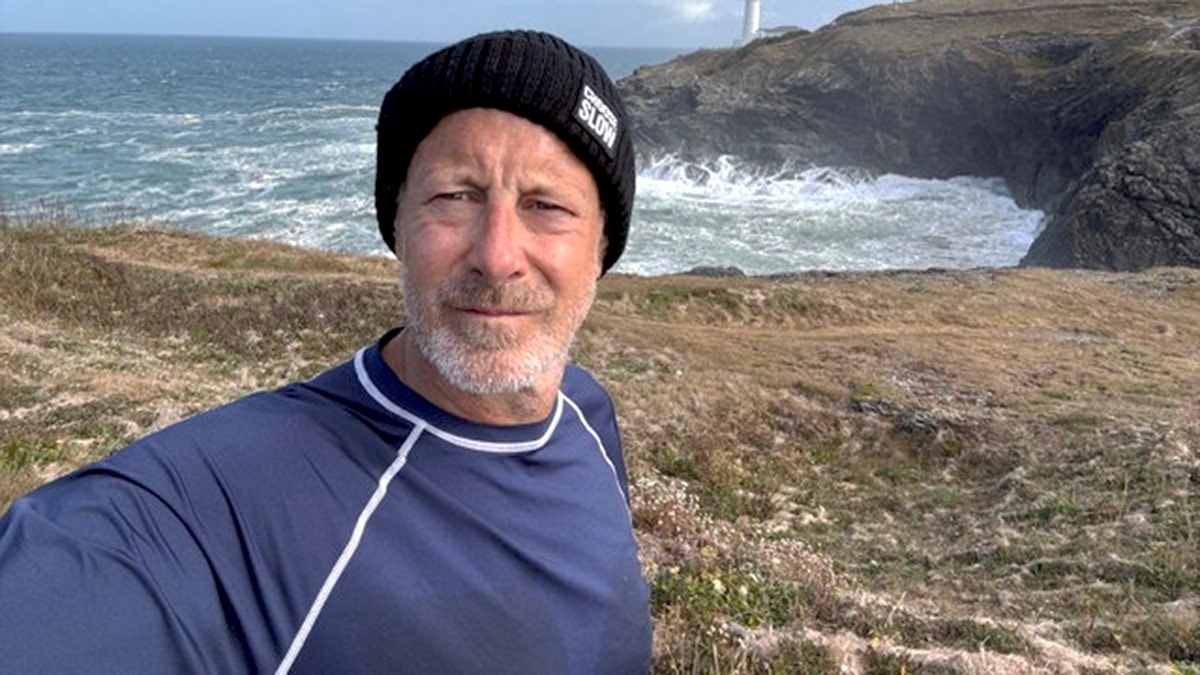 Ed Matthews taking a selfie on the coast.
