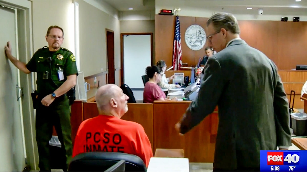 David Allen Funston speaking with his attorney.