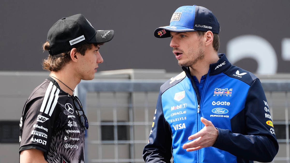 Max Verstappen talks to Kimi Antonelli