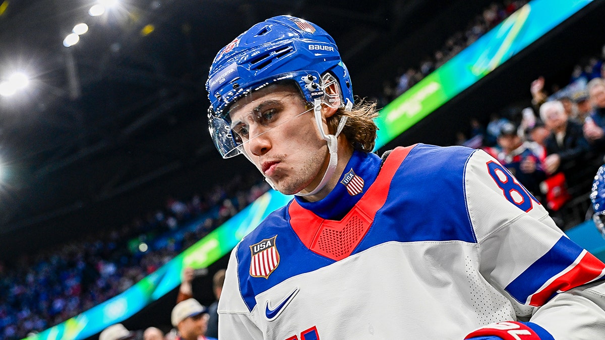 Jack Hughes looks on ice