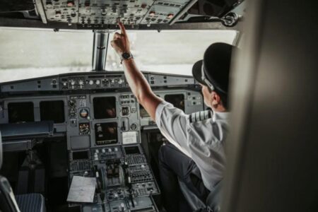 Flyer shocked to see pilot doing this when she caught a glimpse into the cockpit