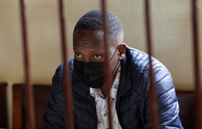 Festus Omwamba sits on the day of his appearance at the Kahawa Law Courts to hear charges of recruiting Kenyans into the Russian armed forces, in Kiambu, Kenya, February 26, 2026. REUTERS/Monicah Mwangi