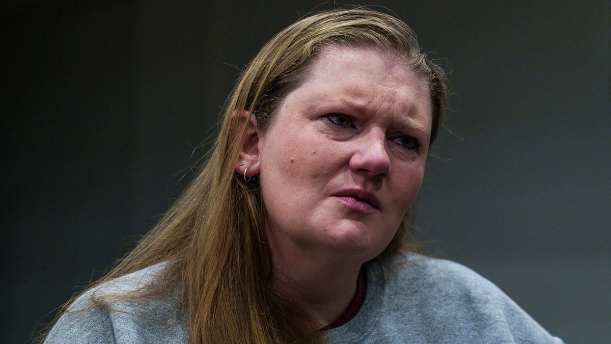 Sarah Pender scrunching her face mid conversation.