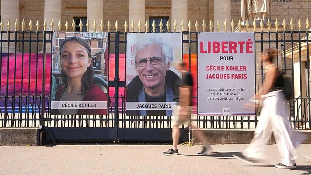 Iran allows two French former detainees to leave country, Macron says