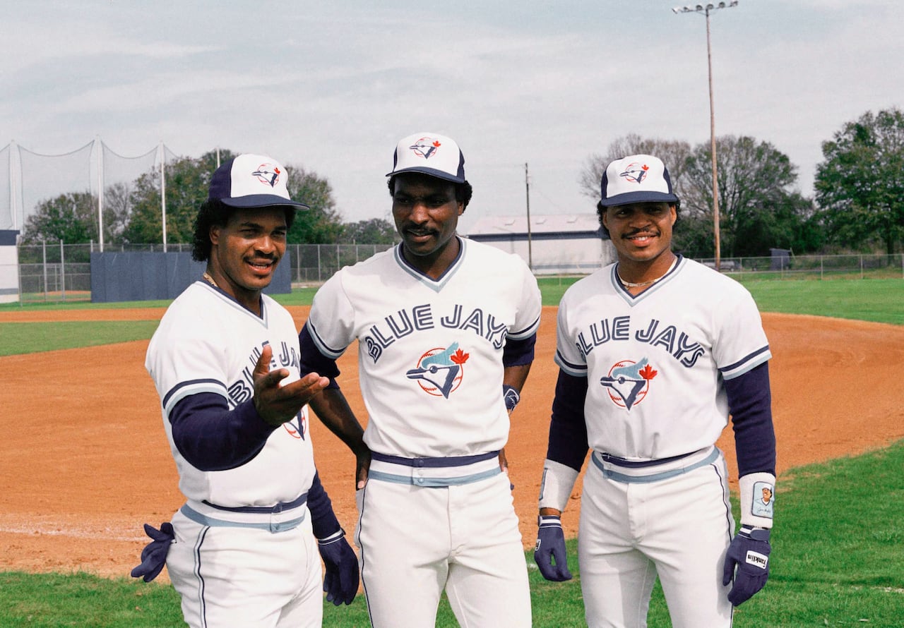 A March 1987 file photo shows then-Blue Jays outfielders George Bell, Lloyd Moseby and Jesse Barfield