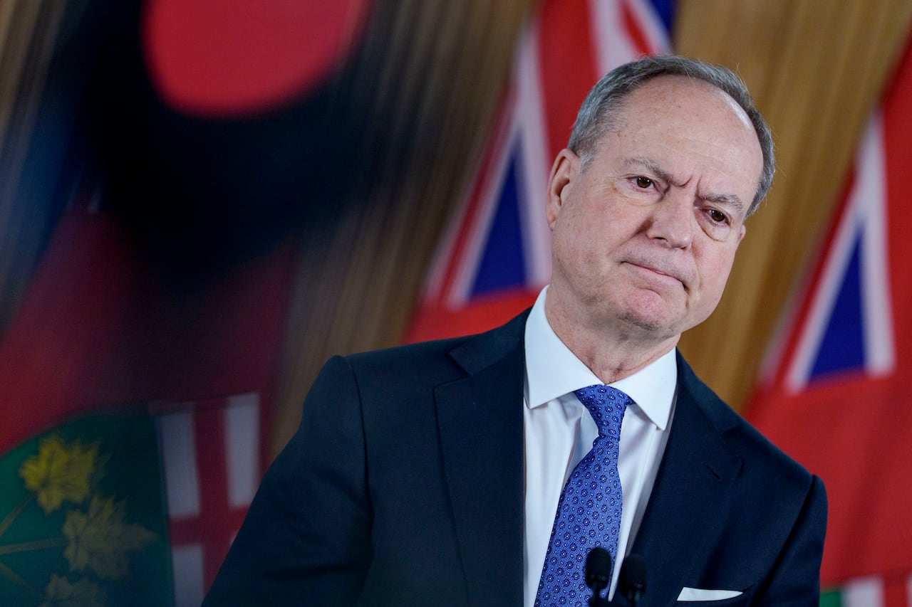 A man speaks into a microphone.