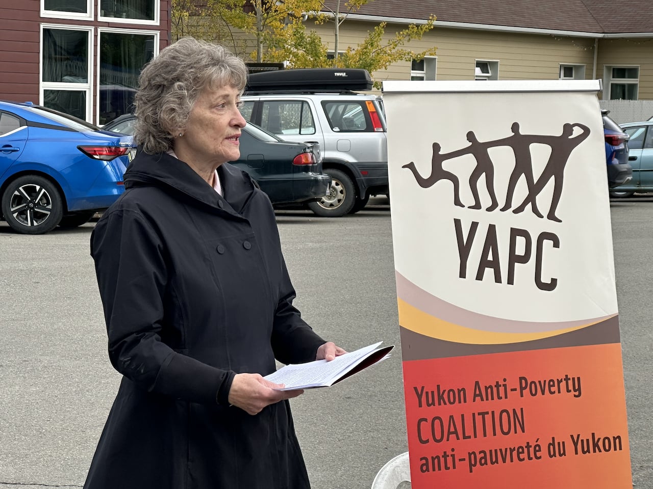 A woman gives a speech.