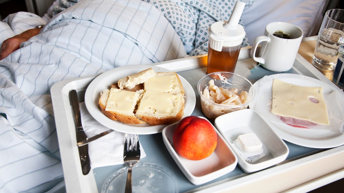 hospital food tray next to patient