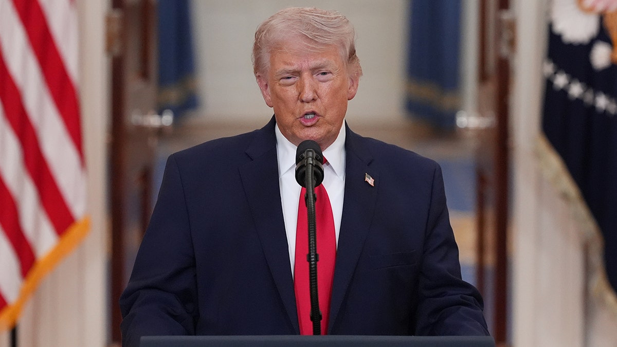 President Donald Trump speaking in the Cross Hall of the White House