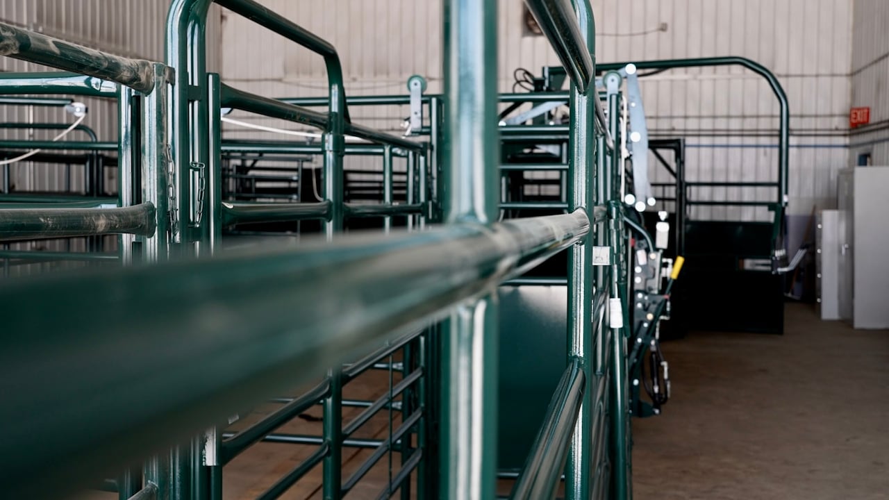 Steel fencing outfitted inside a warehouse building.