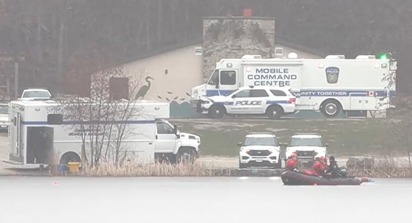 police crews at a lake